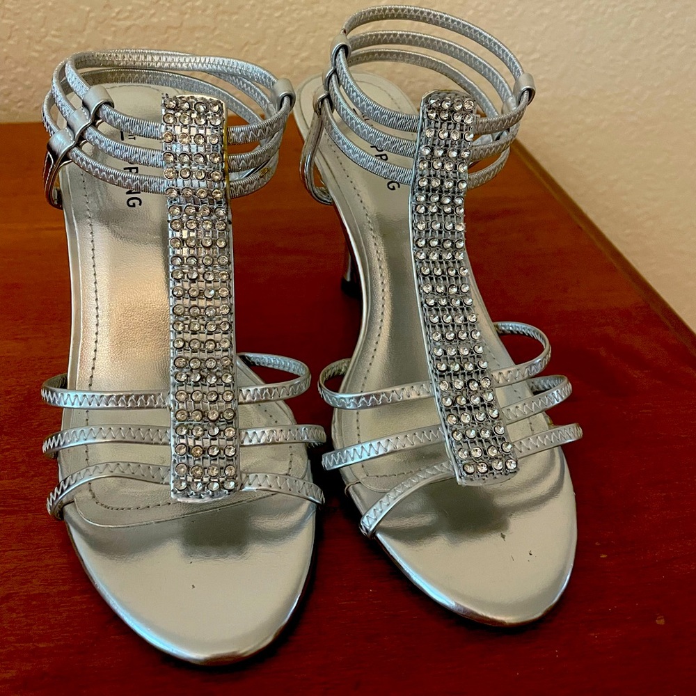 Call it Spring strappy jeweled heels
